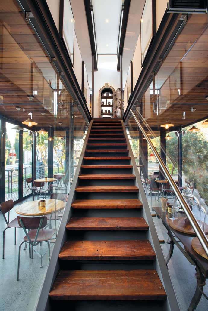 The staircase was designed by Earthworld Architects and built by in-house carpenters using timber from Neil’s personal collection. 
