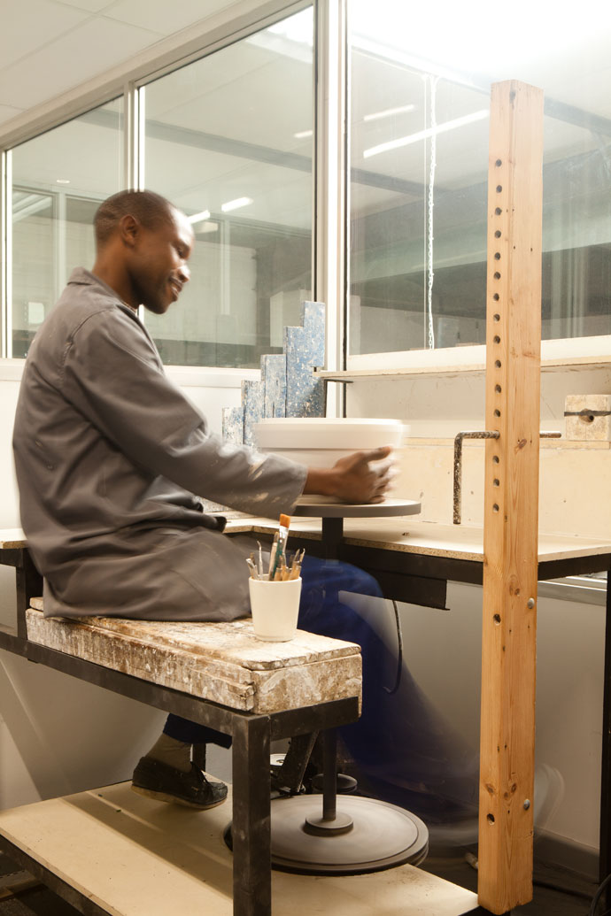 Elson Manziwa operates the mould-making wheel.
